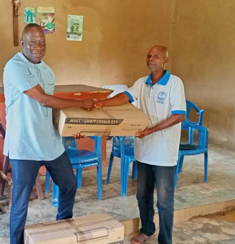 Kadjebi DCE donates street light bulbs to three communities